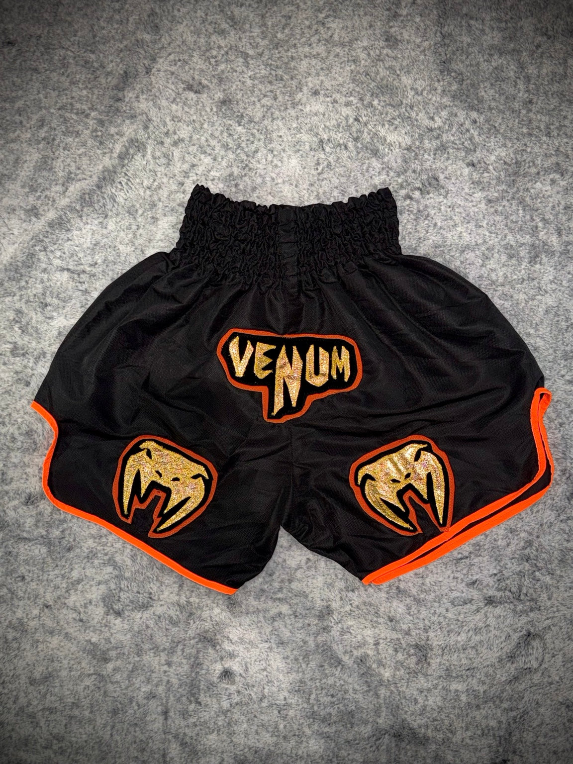 Short Muay Thai Venum Noir & Orange Gold